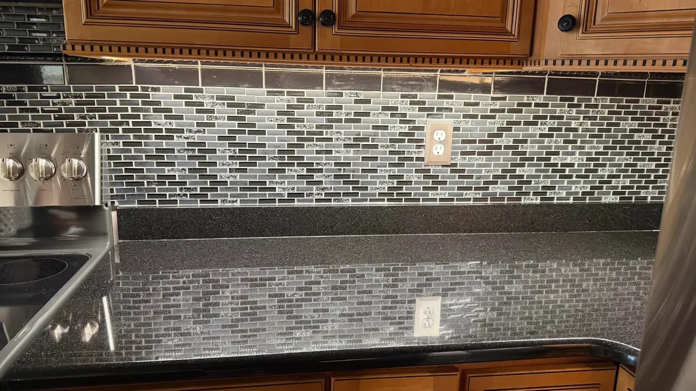 Kitchen under-cabinet lighting and outlet work